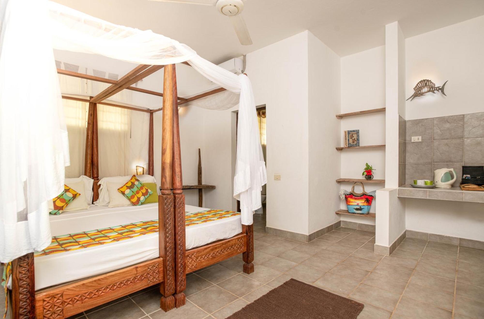 Mvuvi Boutique Resort Kiwengwa  Kamer foto